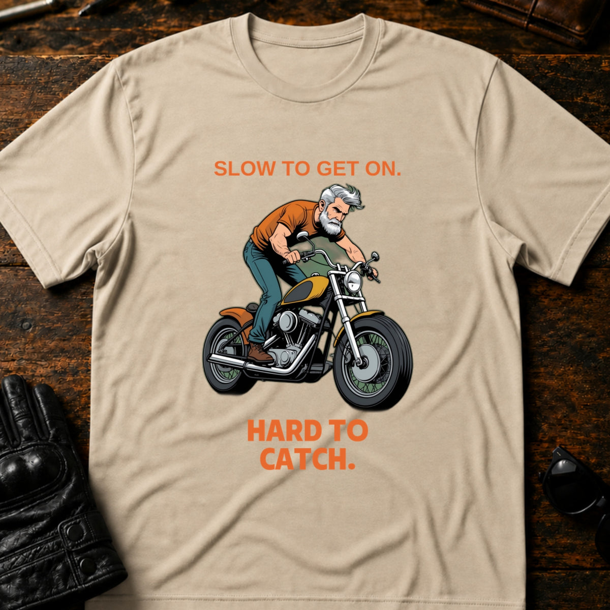 Slow To Get On Hard To Catch Older Biker T-Shirt, sand